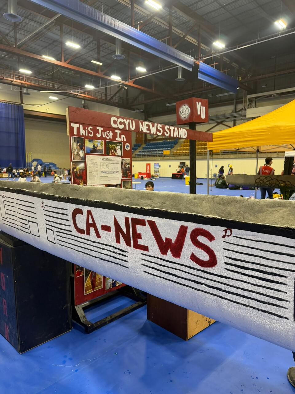 The finished CA-NEWS canoe and CCYU news stand display at CNCCC.